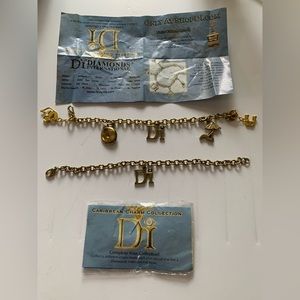 Diamond international charm bracelet with 5 charms and extra bracelet